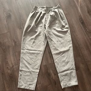 Gray trousers with pleats